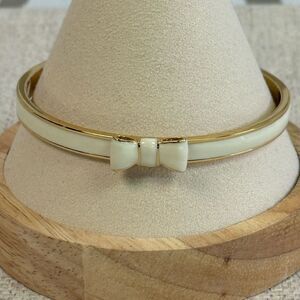 Kate Spade Cream & Gold Enamel Take A Bow Bangle Bracelet